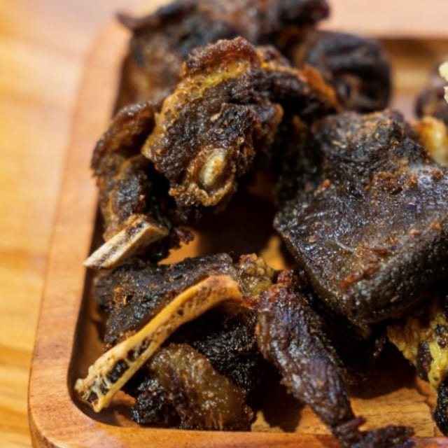 TRAY OF FRIED GOAT.