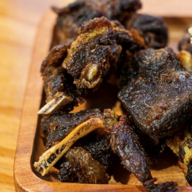 HALF OF TRAY FRIED GOAT.