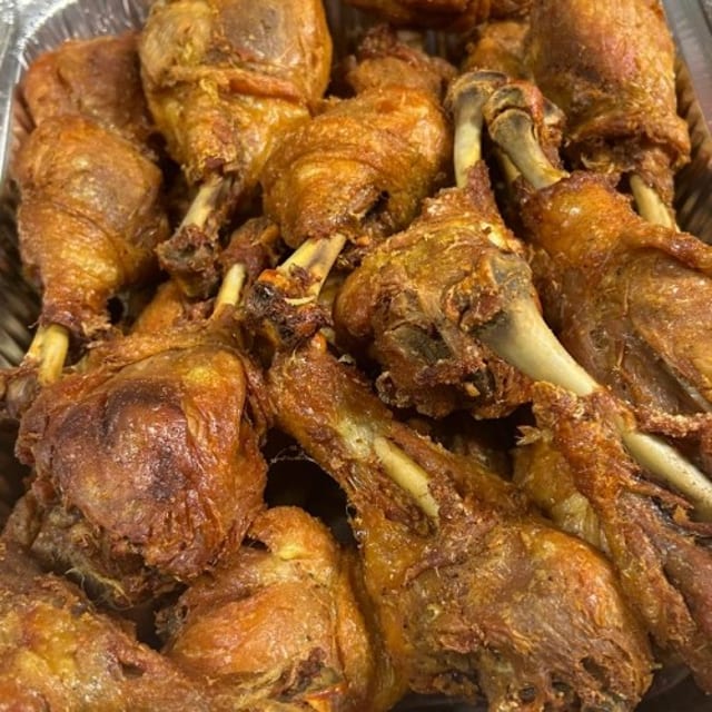 HALF OF TRAY FRIED CHICKEN.